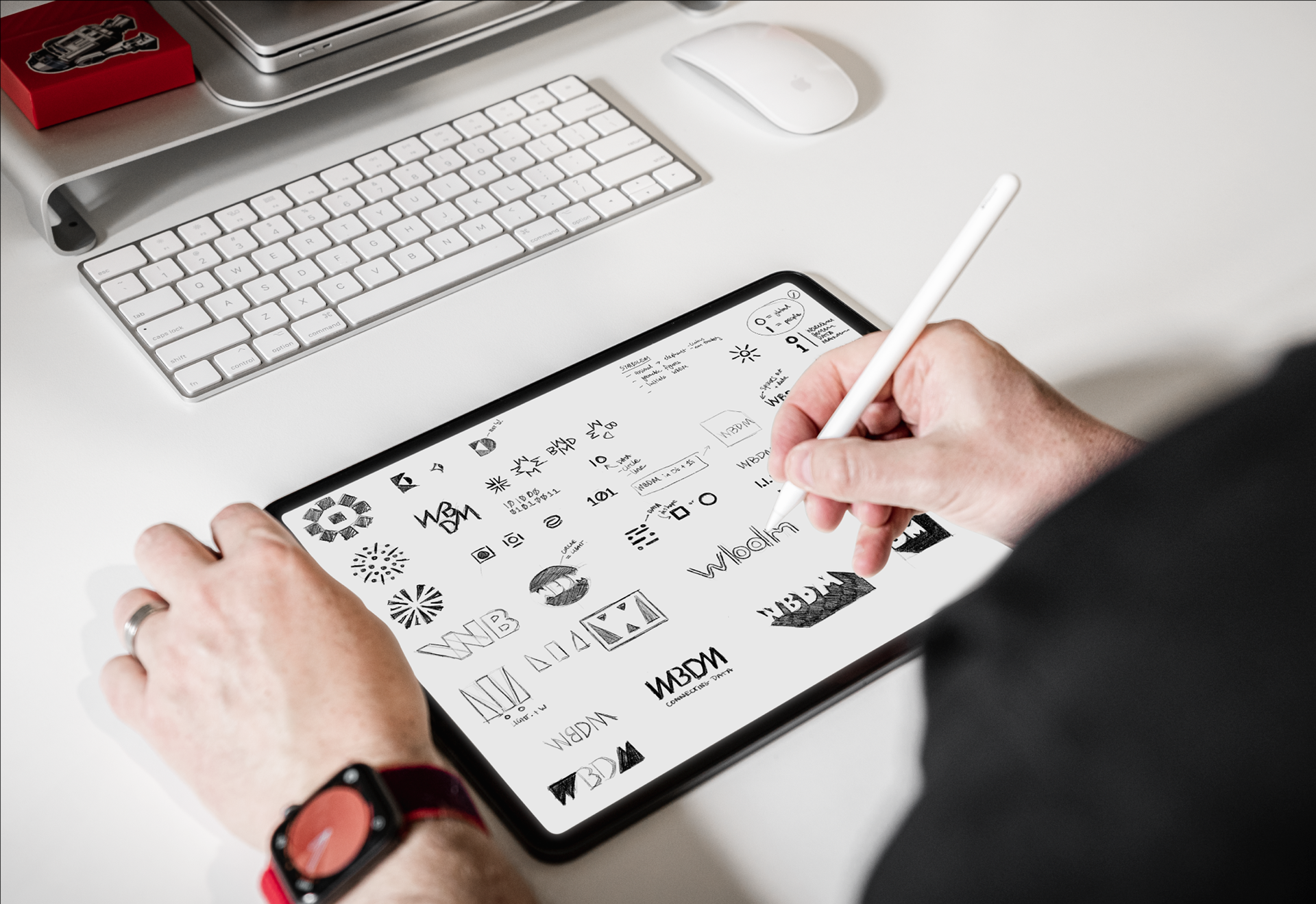 Matt Trapp sketching WBDM logo explorations on iPad